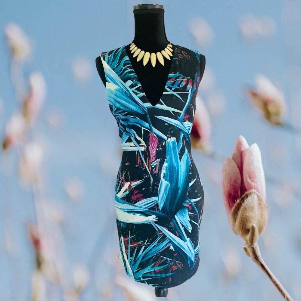 Tropical pattern V neck , dress size M by bebe!
